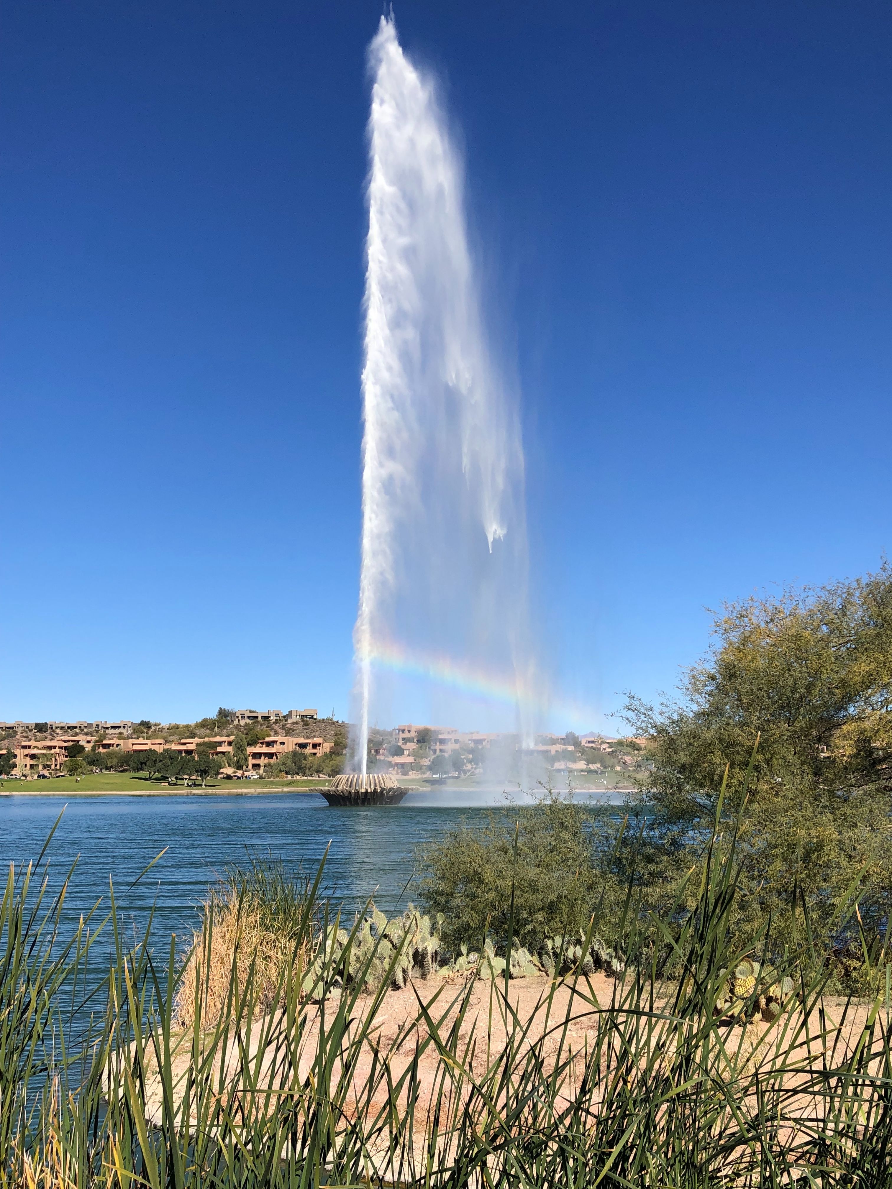 giant fountain with rainbow